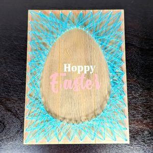 Easter egg string art wooden wall hanging. Teal and pink